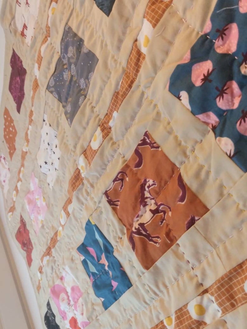 Stitching on pop charmer quilt