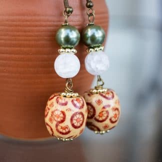 Dangler earrings: Speckled white and ornate wood